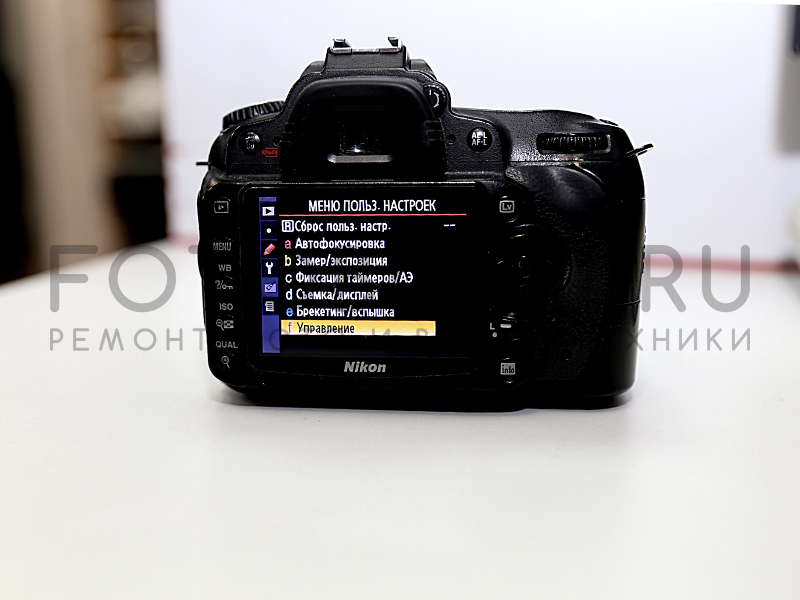 Отремонтированный Nikon D90.